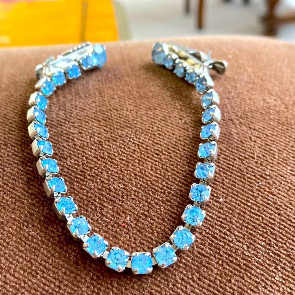 MCM 1950s sky blue glass rhinestone sweater clips.